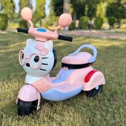 Battery Operated Ride-On Scooter/Scooty : Powered by a long-lasting battery, offering hours of uninterrupted fun for kids. Music & Lights for Fun Rides: Engaging music and bright LED lights make every ride exciting and enjoyable for children. Perfect for Boys & Girls (Up to 4 Years): Designed to be gender-neutral, making it ideal for both baby boys and girls. Safe & Sturdy Design: Built with a durable frame, wide wheels, and easy-grip handles to ensure a stable and secure ride for toddlers. Great Gift for Any Occasion: Perfect for birthdays, holidays, or any special celebration, providing kids with endless hours of joy. Indoor & Outdoor Play: Suitable for various surfaces, allowing children to ride comfortably at home or in outdoor spaces. Easy-to-Use Controls: Simple buttons and controls make it easy for young children to operate independently, boosting their confidence. Kitty Baby Scooter Battery Operated Ride-On Bike With Music, Lights (Up To 4 Years) Kitty Baby Scooter Battery Operated Ride-On Bike With Music, Lights (Up To 4 Years)Kitty Baby Scooter Battery Operated Ride-On Bike With Music, Lights (Up To 4 Years)Kitty Baby Scooter Battery Operated Ride-On Bike With Music, Lights (Up To 4 Years)Kitty Baby Scooter Battery Operated Ride-On Bike With Music, Lights (Up To 4 Years)