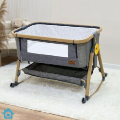 Bedside baby cot with swing rods